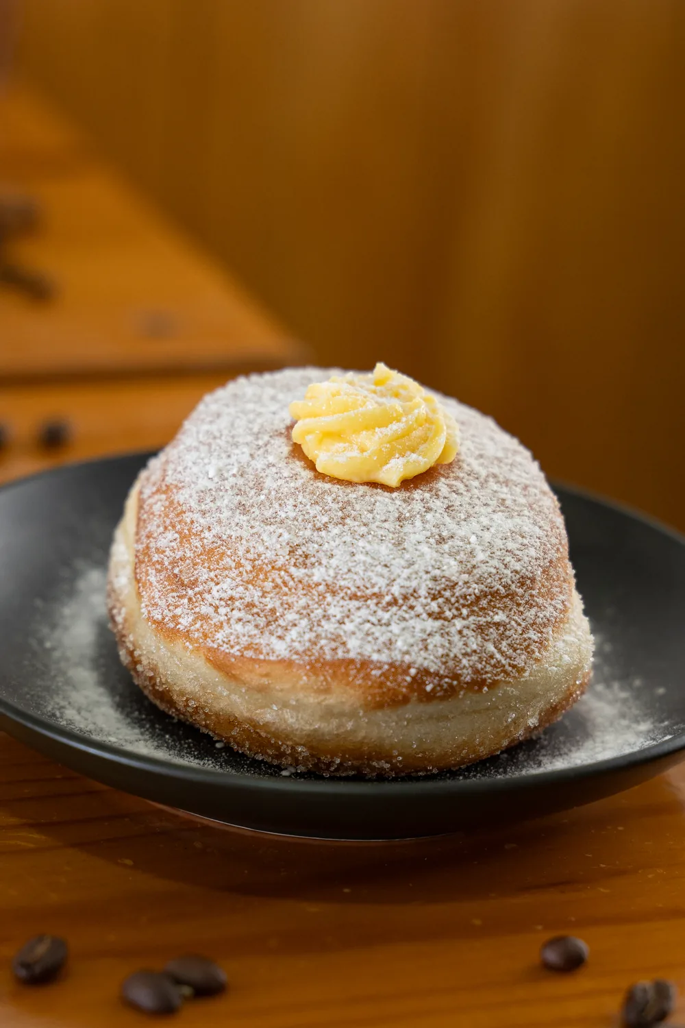 Italian bombolone filled with custard and made fresh daily